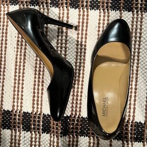 Michael Kors round toe pumps.
